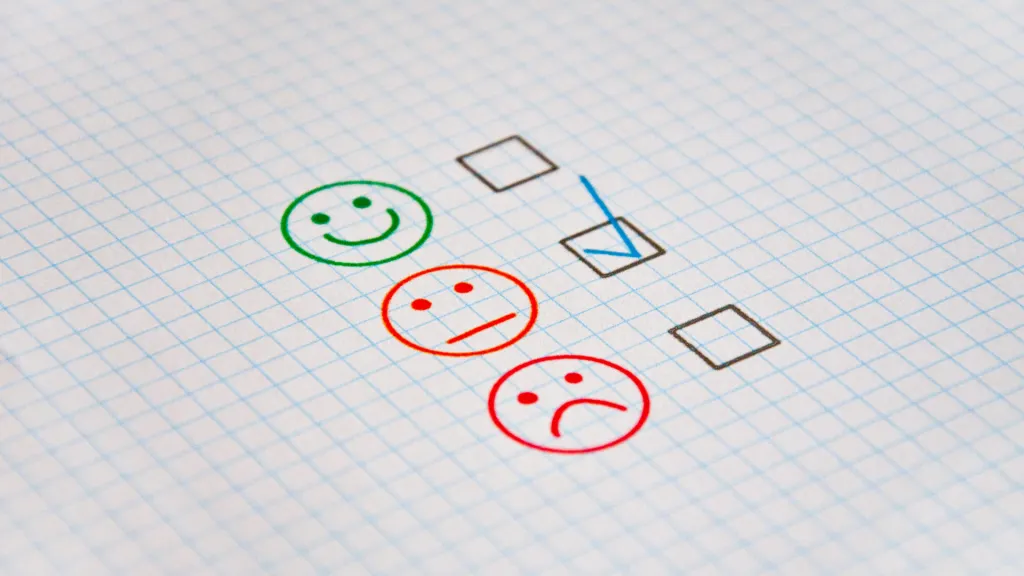 a group of smileys and a check box